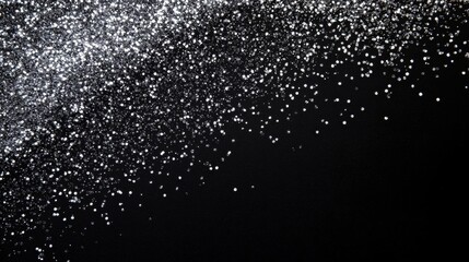 Silver Glitter on Black Background: A Festive Sparkle