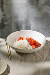 plate of fried chicken and vegetables in sweet and sour sauce