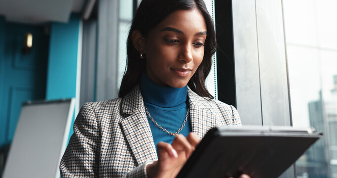 Typing, tablet and research with business woman in office for workshop coordinator, reading and corporate trainer. Feedback, planning and conference organizer with person in agency for schedule