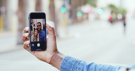 Couple, hands and city with phone camera for selfie, photography or picture in street. Closeup, man or woman with mobile smartphone screen for capture moment, travel memory or app in an urban town
