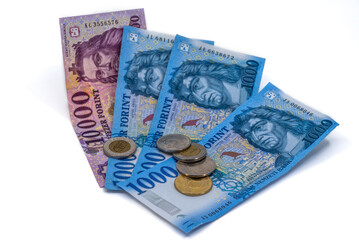 Hungarian forint banknotes and coins arrangement

