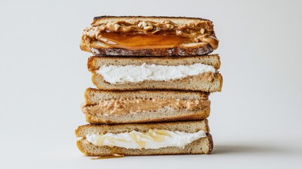 A delicious stack of three slices of toasted bread, each with a different topping like cream cheese, nut butter, and honey, artfully arranged against a bright white background.