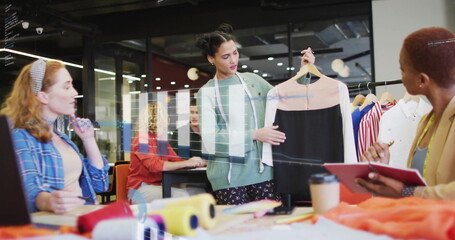 Image of financial data processing over diverse creative business people in office