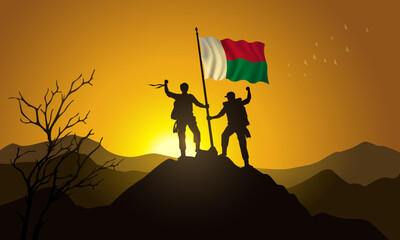Madagascar flag, silhouette of two climbers holding a flag at sunset over the mountain