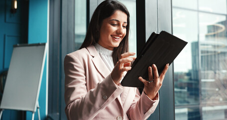 Smile, business and woman on tablet in office for research, corporate planner and schedule conference. Female coordinator, digital and event info with client feedback, guest list and program layout