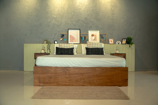 bed in asthetic ambience with Grey background warm light