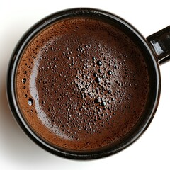 Close-up of dark coffee in mug, white background; perfect for beverage ads