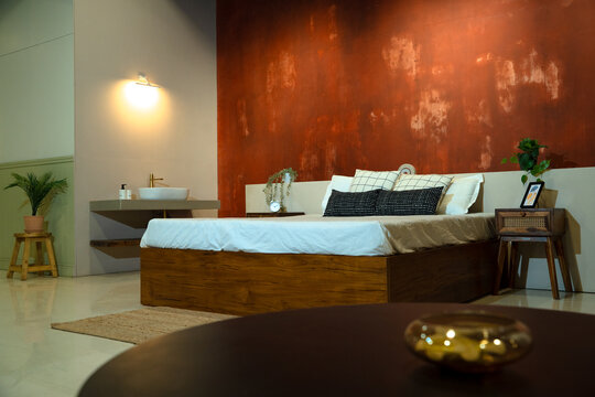 bed in asthetic ambience with orange background
