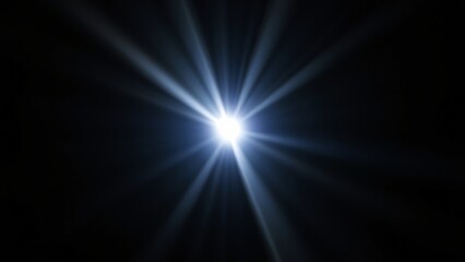 Bright Starburst Light Flare on Black Background