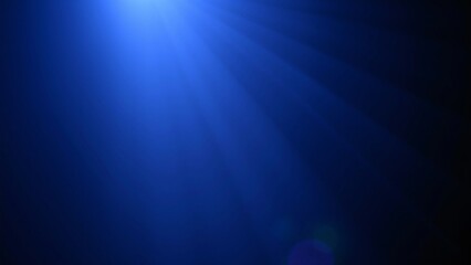 Celestial Blue Light Rays Dramatic Dark Blue Background with Lens Flare