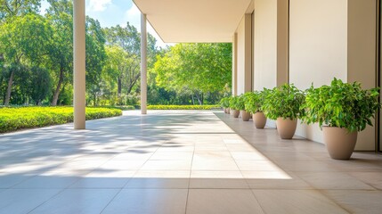 Naklejka premium Modern Architectural Landscape with Lush Greenery and Elegant Planters in Bright Natural Light, Showcasing a Serene Outdoor Space