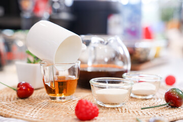 Cake Ingredients Glass jars of oatmeal and yellow honey,Dripping honey,Tea