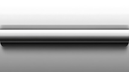 Sleek cylindrical object rests on a light grey surface