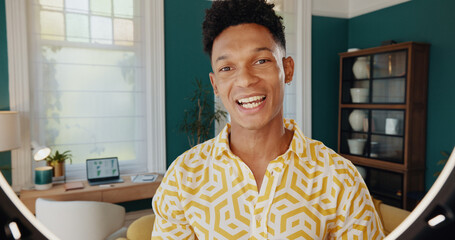 Happy man, portrait and influencer with ring light for web service, online streaming or recording...