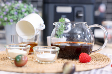 Cake Ingredients Glass jars of oatmeal and yellow honey,Dripping honey,Tea