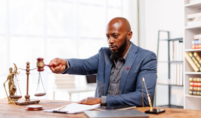 African American man or Businessman Lawyer or attorney working in office. Law and justice concept
