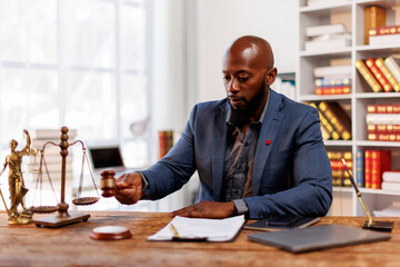 African American man or Businessman Lawyer or attorney working in office. Law and justice concept
