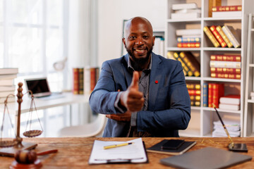 Fototapeta premium African American man or Businessman Lawyer or attorney working in office. Law and justice concept