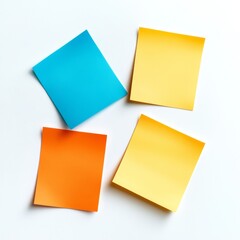 Fototapeta premium Four colorful sticky notes on white background.