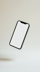 A sleek black smartphone with a blank white screen floats against a minimalist beige background.