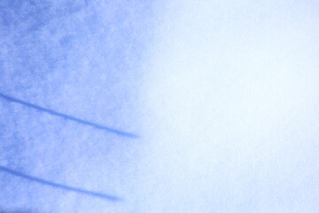 雪面に棒の影が作る光のアート © 写真小僧