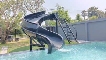 Close up black slide in the swimming pool
