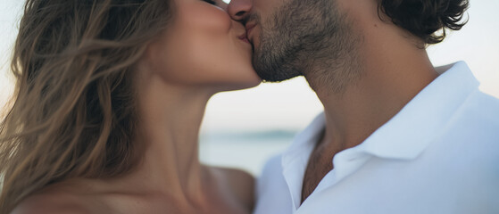 Naklejka premium Tender Kiss at Sunset: A close-up captures a romantic moment between a couple sharing a tender kiss, bathed in the warm glow of a setting sun. The image evokes feelings of intimacy, love.