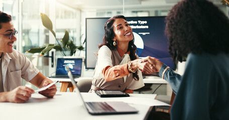 Happy business people, startup and handshake for deal, brand sponsorship or collaboration. Smile, creative team and shaking hands for cooperation, b2b partnership and negotiation agreement in office