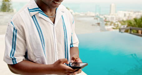 Pool, hands and man with smartphone, typing and summer holiday with internet, texting and tourism....