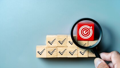 Business Strategy Planning and Quality Management Concept. Magnifying glass focuses on target