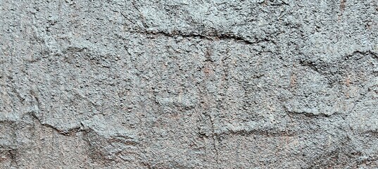 The weathered iron background is exposed to HCL