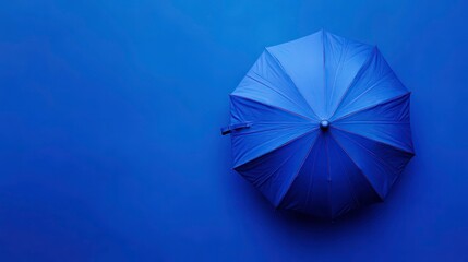 Blue umbrella isolated on blue background. isolated on a solid blue background. Illustrations