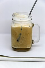 Jasmine Iced Coffee. Made from premium Arabica beans and infused with the subtle sweetness of jasmine, this chilled beverage offers a smooth and invigorating taste.