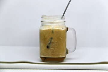 Jasmine Iced Coffee. Made from premium Arabica beans and infused with the subtle sweetness of jasmine, this chilled beverage offers a smooth and invigorating taste.