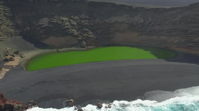 Aerial drone view of mountain sea and volcanoes in Lanzarote, Canary Islands, Spain