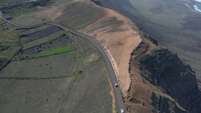 Aerial drone view of mountain sea and volcanoes in Lanzarote, Canary Islands, Spain