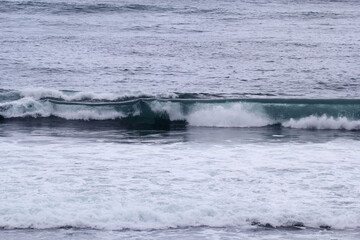 Medium-sized wave breaking in the ocean