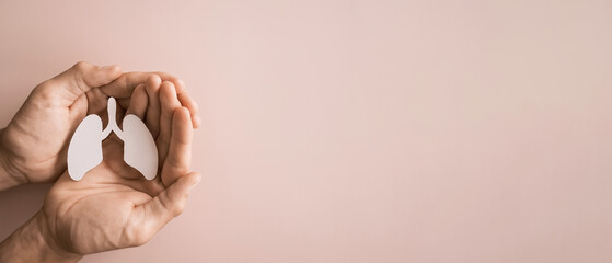 hands holding paper lung, world tuberculosis tb day, world no tobacco day, lung cancer,COPD, eco...