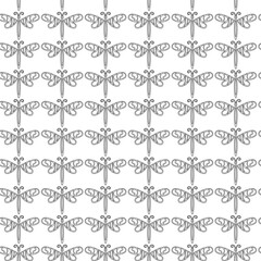 Seamless black and white pattern featuring dragonfly with decorative wing details. Ideal for textiles, wallpapers, backgrounds, and nature-themed designs