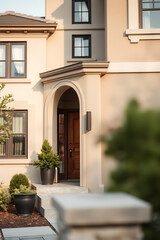 Fototapeta premium Elegant Home Exterior: Modern Architecture and Landscaping Design. Discover luxury real estate with a classic facade, stylish entrance, and beautiful landscaping.