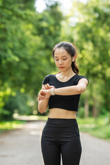 A woman in sportswear running in the park, enjoying fresh air, engaging in outdoor activities to maintain a healthy lifestyle, boosting cardiovascular health, and feeling happy and energetic