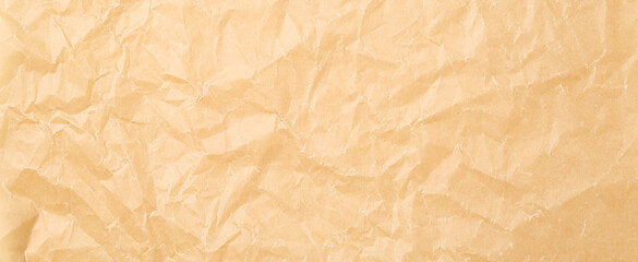 Crumpled sheet of baking paper as background, closeup