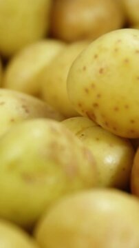 Close-up of raw potatoes in basket