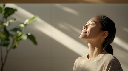 Woman enjoying sunlight and peace.