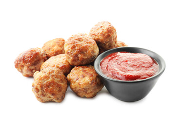 Pile of delicious meatballs and bowl with ketchup isolated on white