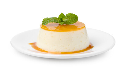 Tasty pudding with caramel sauce and mint isolated on white