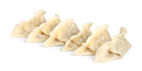 Tasty boiled gyoza (dumplings) isolated on white