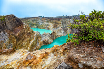 Crater lakes Danau Alapola and Kootainuamuri, Volcano Kelimutu, Island Flores, Indonesia, Southeast Asia.