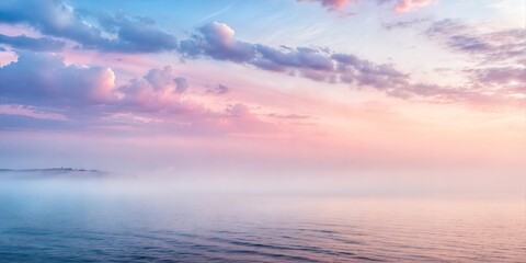 Fototapeta premium Misty Sunrise over Calm Water