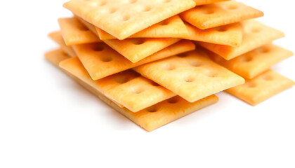 Fototapeta premium stacked pile of crispy saltine crackers on white background